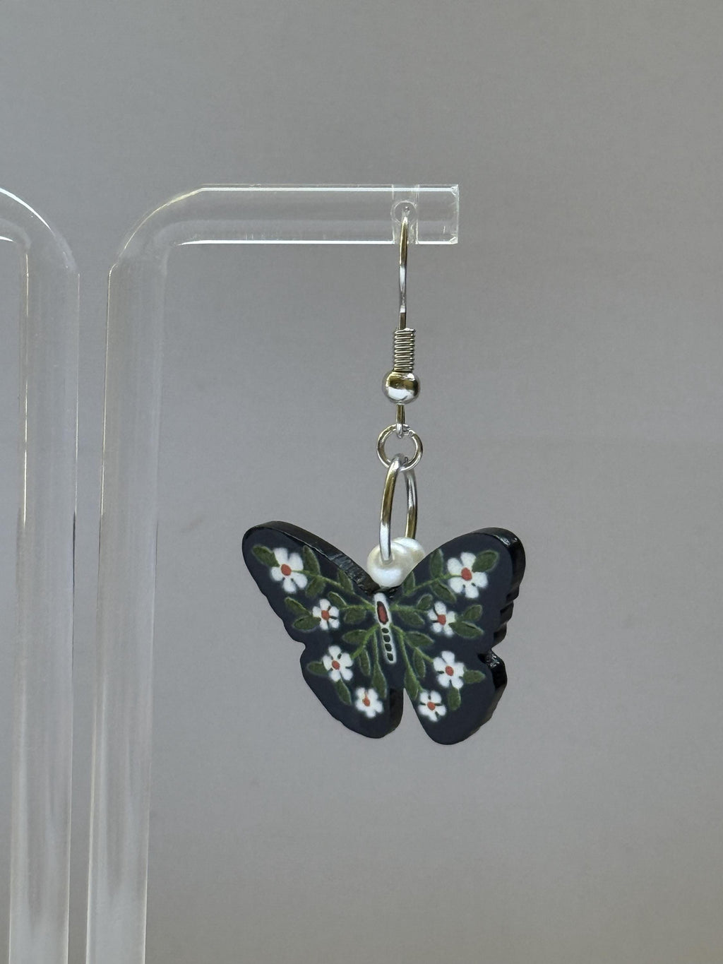 Dark Garden Earrings – Butterfly Dangles with White Flowers & Green Leaves