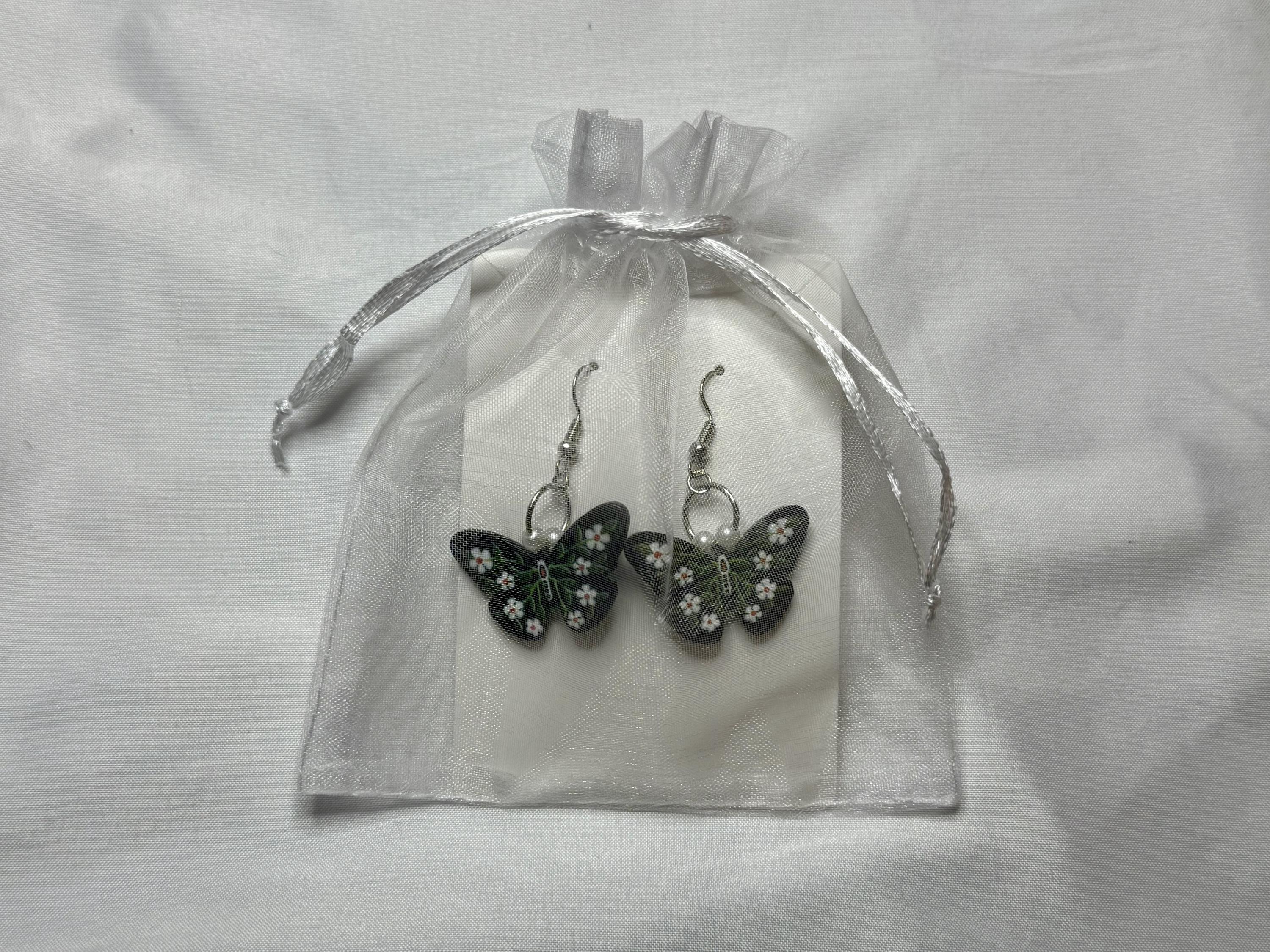 Dark Garden Earrings – Butterfly Dangles with White Flowers & Green Leaves