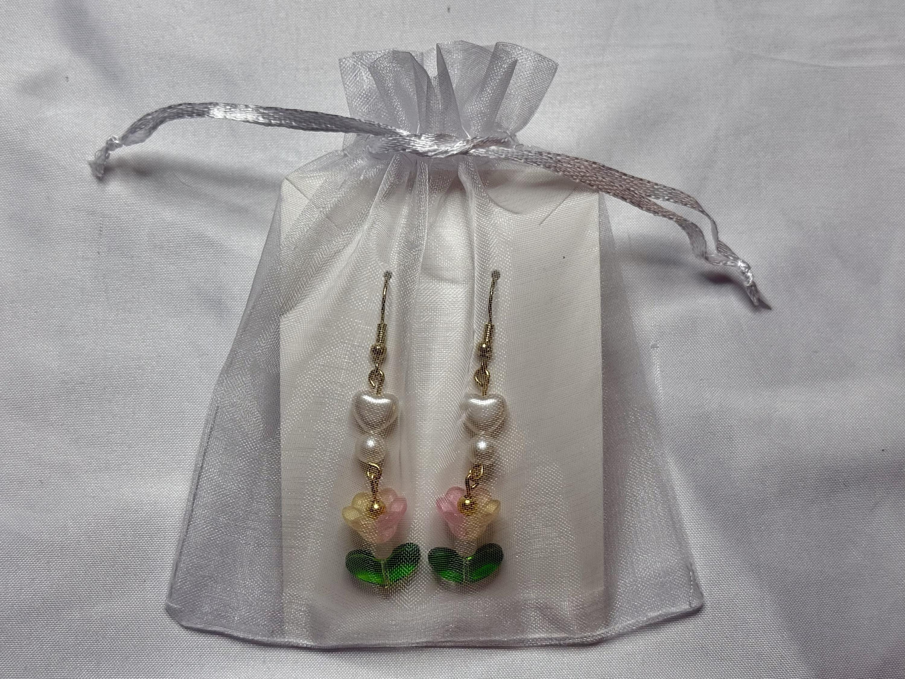 Garden Bloom Earrings – White Hearts & Pink Flower Beads with Green Leaf Accent